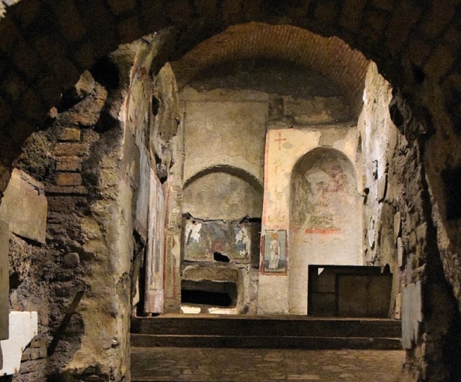Underground chapel with the tombs of martyrs Felix and Adautto. Catacombs of Commodilla, Rome