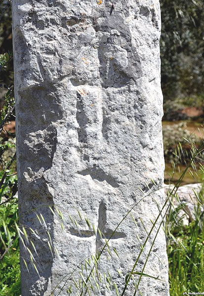 Engraved crosses on a menhir.