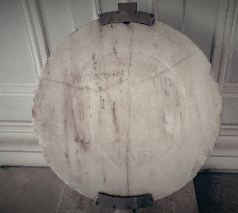 Circular stone with footprints of Archangel Michael (ex-voto), Rome, Capitoline Museums.