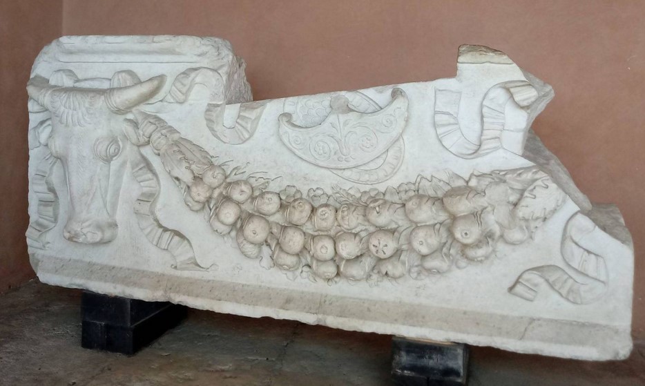 One of the marble friezes decorated with garlands and bucrania at the National Roman Museum.